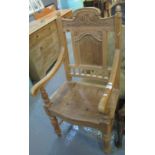 Modern pine carved open armchair. (B.P. 24% incl.