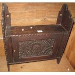 17th Century style carved oak single door blind panelled wall cabinet. (B.P. 24% incl.