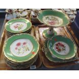 Two trays of 19th Century English porcelain botanical cabinet plates and tazzas,