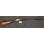 .410 single barrelled underlever hammer shotgun with canvas slip.