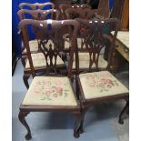 Set of six mahogany Chippendale style dining chairs with drop in seats standing on cabriole legs.