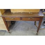Late 19th/early 20th Century mahogany two drawer writing desk with leather inset top on tapering