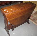 Early 20th Century oak gate legged table with beaded decoration and barley twist supports. (B.P.