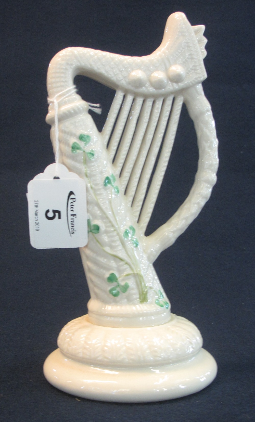 Belleek porcelain study of a an Irish harp, black printed mark to base. 22cm high approx. (B.P.