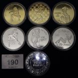 Collection of white metal and silver plated gambling tokens with female nudes. (B.P. 24% incl.