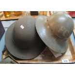 Three British World War Two ladies fany helmets. (B.P. 24% incl.