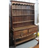 18th Century style oak potboard dresser with boarded three shelf rack back over two deep drawers