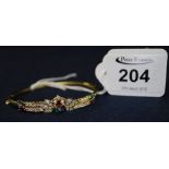 18ct gold gem set bangle. (B.P. 24% incl.