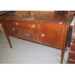 Late 19th/early 20th Century mahogany sideboard on square tapering legs and spade feet. (B.P.