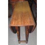 20th Century oak gate legged table. (B.P. 24% incl.