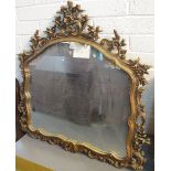 Large gilt framed over mantel mirror, overall with pierced, scroll foliate and petal decoration. (B.