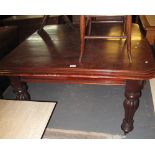 Victorian mahogany extending dining table on fluted tapering legs and casters. (B.P. 24% incl.
