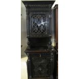 Late 19th Century stained oak Flemish style two stage stained glass cabinet. (B.P. 24% incl.
