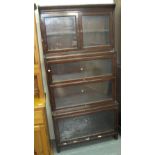 Early 20th Century oak waterfall design Wernicke type bookcase. (B.P. 24% incl.