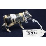 925 silver enamelled small model of a standing cow with Swiss cow bell. 7cm long approx. (B.P.