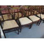 Set of four 19th Century mahogany camel back dining chairs with upholstered seats on square