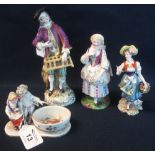 Assorted German porcelain figurines to include; open salt with two children, flower seller woman,
