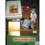 Box of assorted items to include; a Lladro musical clown, Walt Disney Beswick donkey,