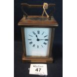 Early 20th Century French brass carriage clock with full depth Roman face and key. (B.P. 24% incl.