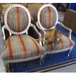 Pair of modern silver oval open arm chairs with striped upholstery (2). (B.P. 24% incl.