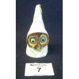 Royal Worcester porcelain candle snuffer in the form of a hooded owl,