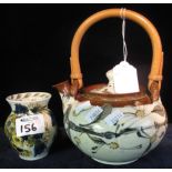 Gwili pottery floral teapot with bamboo handle, together with a Gwili pottery floral baluster vase.