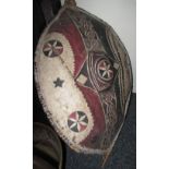 Painted hide tribal shield. (B.P. 24% incl.