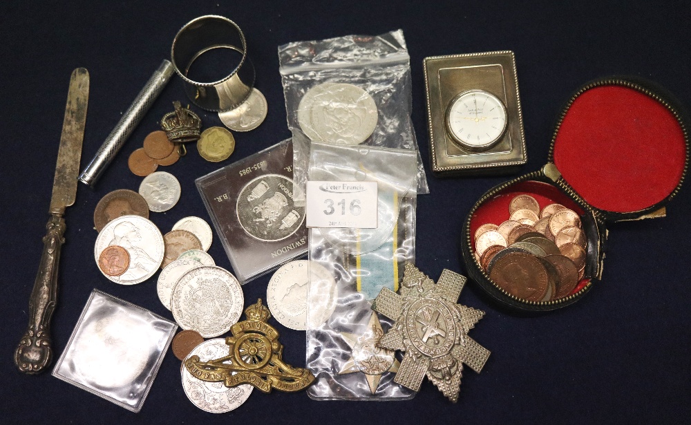 Bag of assorted items to include; QE II crowns, napkin ring, military medal, military insignia,