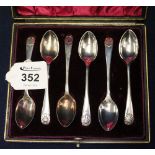 Cased set of six shell design coffee spoons, Sheffield hallmarks. (B.P. 24% incl.