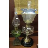 Art nouveau design double oil burner having blue and clear glass frilled shade,