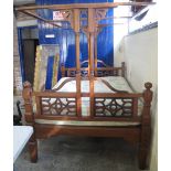 A modern hardwood double canopy bed with mattress. (B.P. 24% incl.