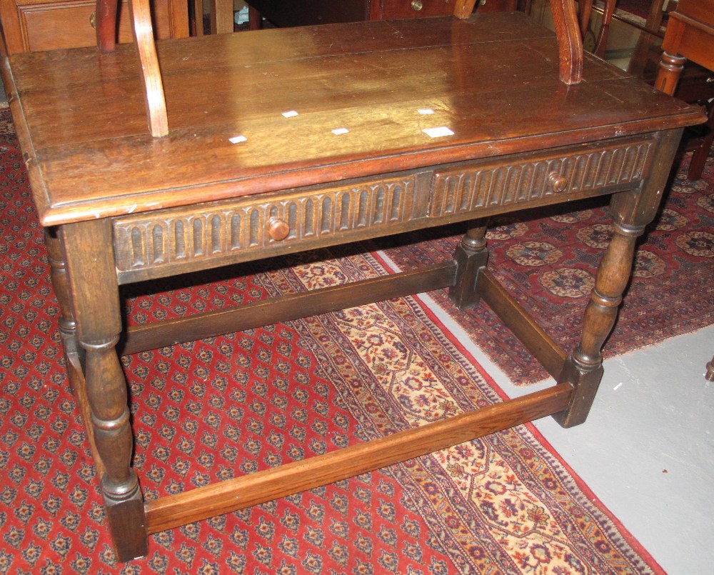 Early 20th Century oak two drawer side table on turned supports and stretchers. (B.P. 24% incl.