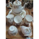 Tray of Colough bone china teaware on a white ground with Autumn leaf decoration. (B.P. 24% incl.