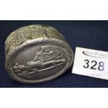 Oval continental silver repousse decorated box with hinged cover decorated with figure in armour,