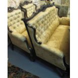 Three piece Edwardian mahogany parlour suite comprising two seater sofa and a pair of armchairs.