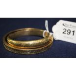 9ct gold engraved slave bangle and a 9ct gold engraved bangle. (B.P. 24% incl.