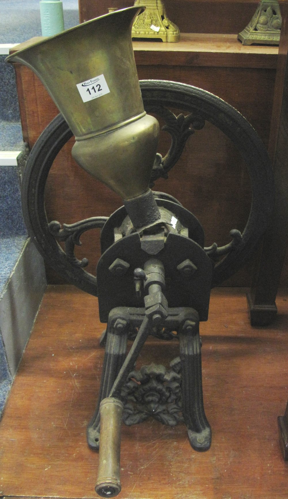 Cast iron and brass table top coffee grinder. (B.P. 24% incl.