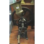 Cast iron and brass table top coffee grinder. (B.P. 24% incl.