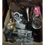 Box of assorted metalware to include; school bell, various brass candlesticks, goblets,