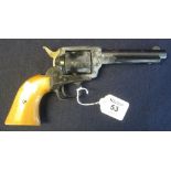 .22 blank firing replica colt six shot revolver with wooden grip.