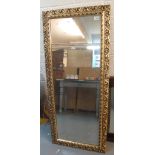 Modern gilt foliate framed rectangular bedroom mirror. (B.P. 24% incl.