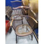 Pair of stained, spindle back Windsor-type arm chairs with cain seats. (B.P. 24% incl.