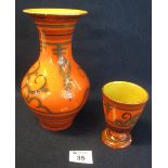 A pottery Dutch Gouda flora pottery baluster shaped orange ground vase,