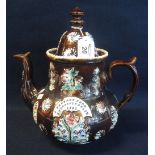 Large 19th Century Meesham pottery bargeware treacle glazed baluster shaped teapot overall sprigged