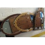 Early 20th Century oak framed oval bevelled plate mirror together with two modern gilt framed