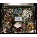 Tin box containing assorted costume jewellery, various. (B.P. 24% incl.