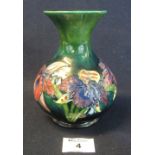 Moorcroft art pottery baluster shaped vase with flared neck,