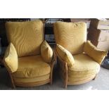 Pair of light elm ercol, upholstered, slat back arms chairs with gold label (2). (B.P. 24% incl.