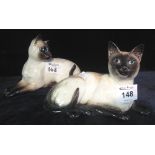 Two Beswick pottery recumbent cats. (2) (B.P. 24% incl.
