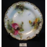 Royal Worcester porcelain cabinet plate painted with roses on a white ground with gilded shell
